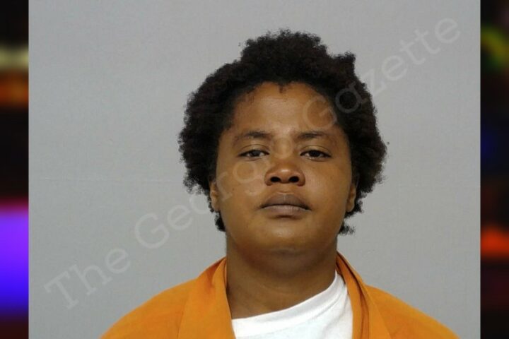 Macon mother caught on video beating daughters with belt broom handle