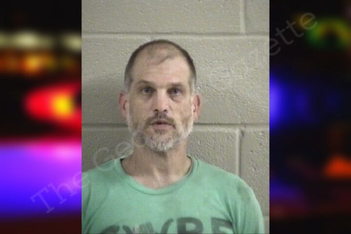 Dalton man charged after deputies find him spying on women through drilled hole outside home
